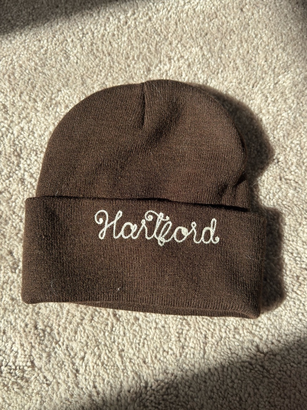 Hartford Brown Knit Cuffed Beanie with White Script